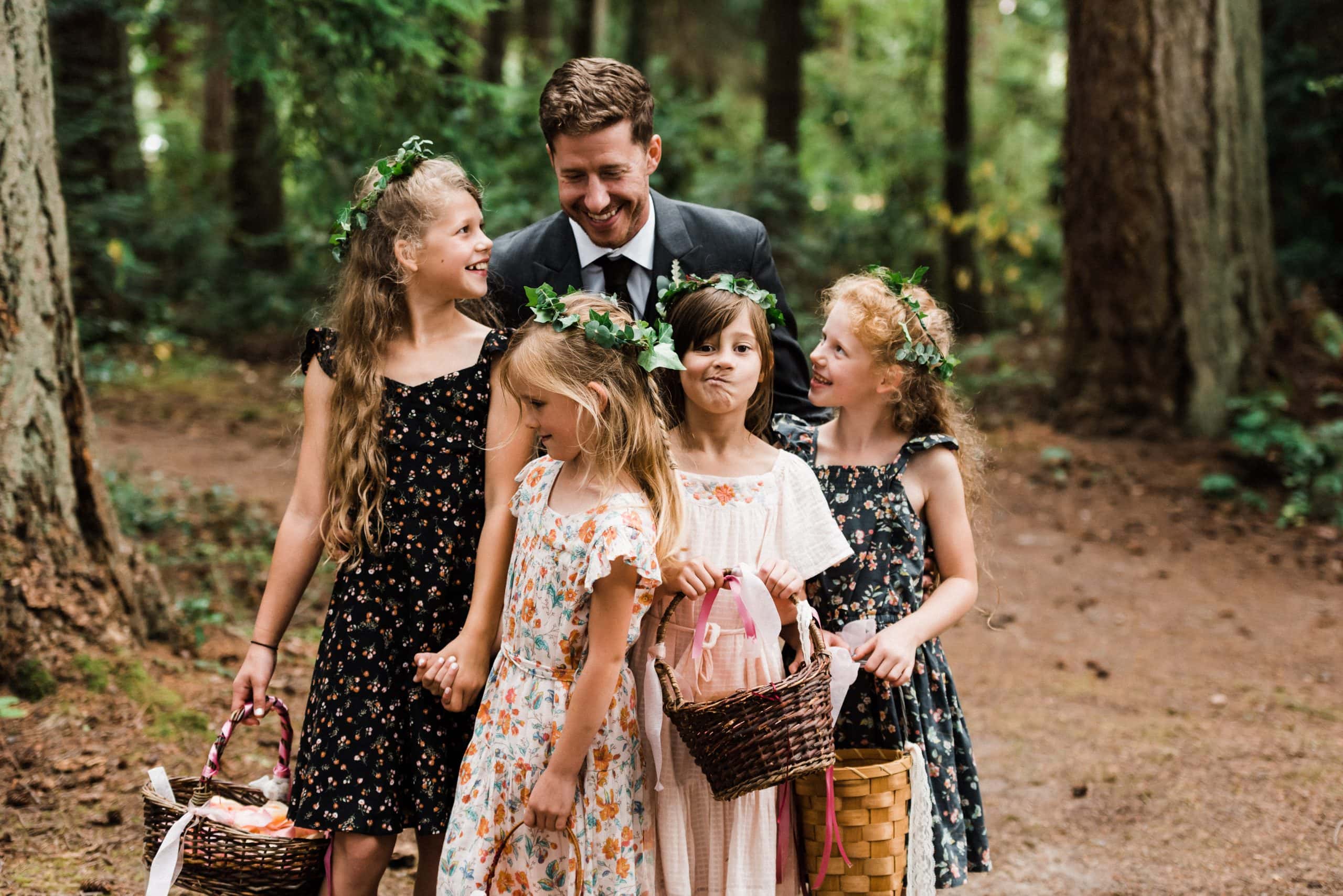 Flower girls with the groom at an intimate wedding in the Pacific Northwest.